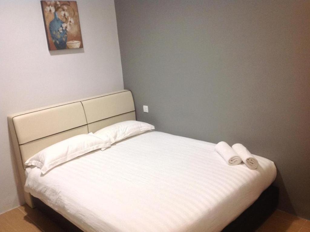 Postel nebo postele na pokoji v ubytování Welcome Inn GM