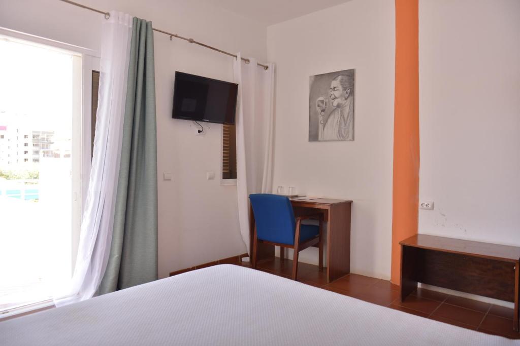 TV a/nebo společenská místnost v ubytování Residencial Che Guevara Bed & Breakfast