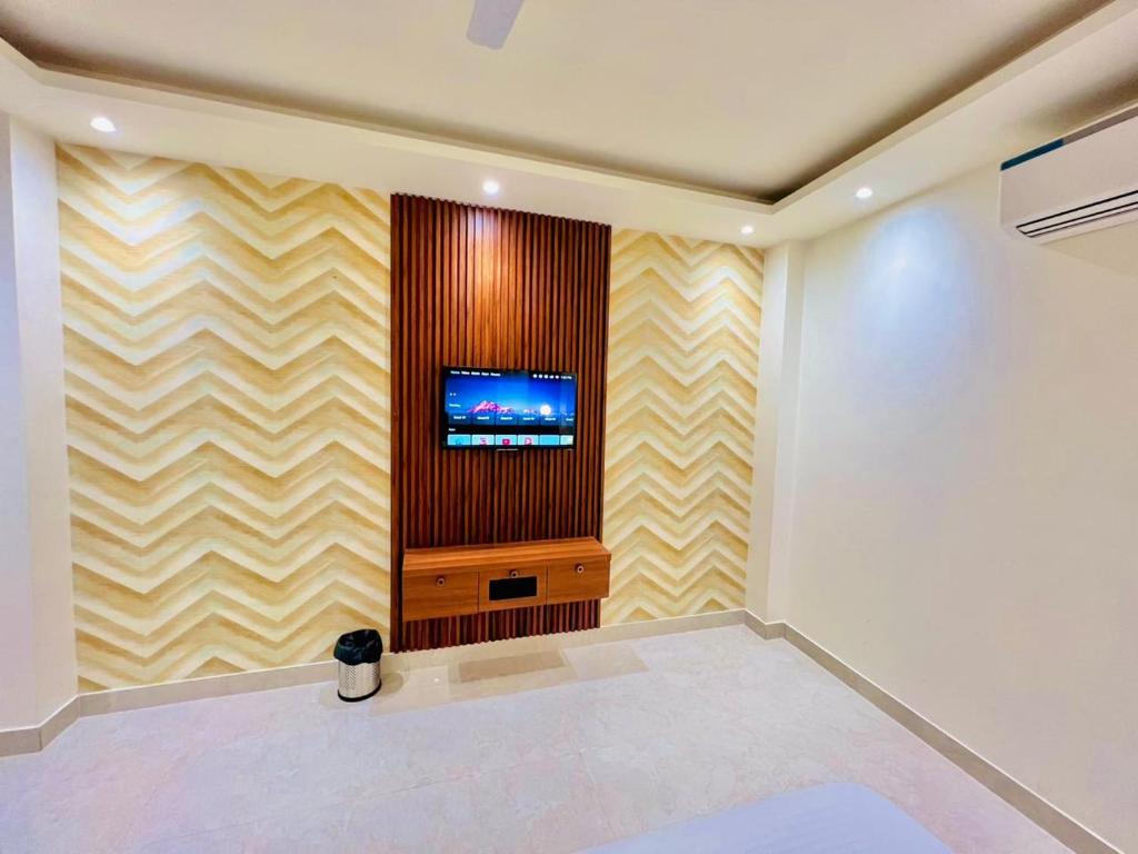 TV a/nebo společenská místnost v ubytování Hotel RIVERB