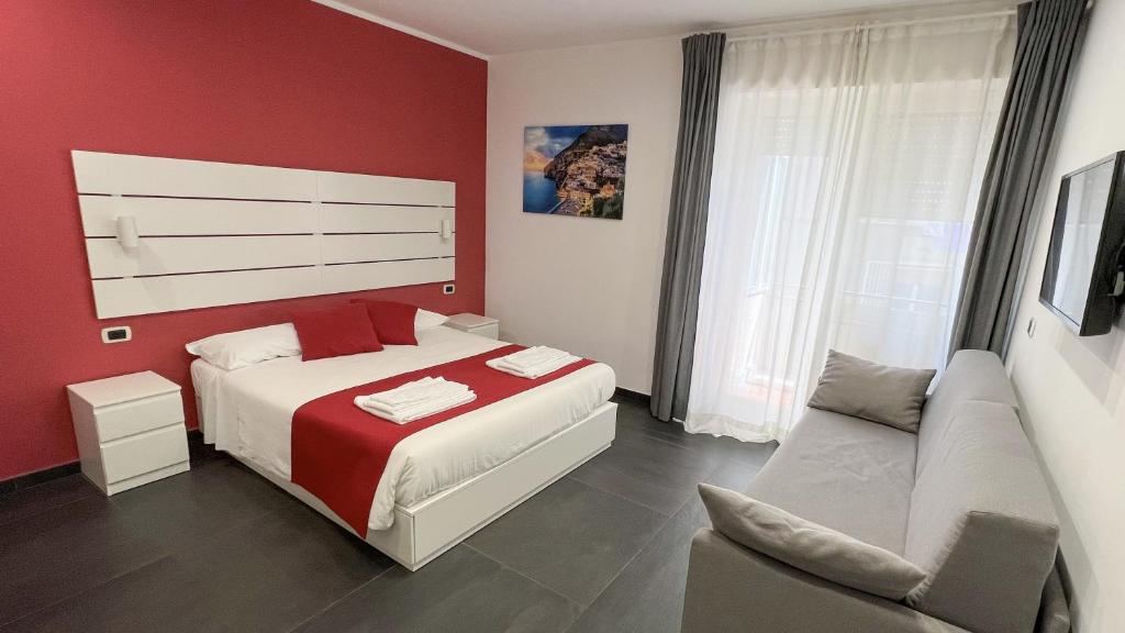 Łóżko lub łóżka w pokoju w obiekcie Soave Rooms