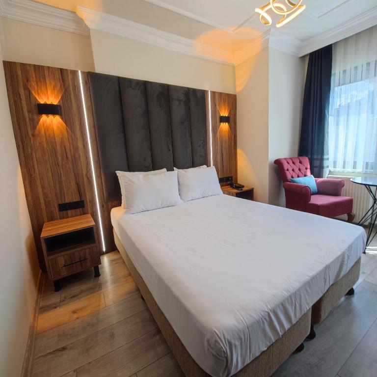 Postel nebo postele na pokoji v ubytování Star Hotel