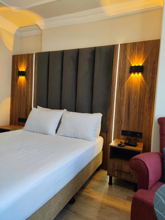 Postel nebo postele na pokoji v ubytování Star Hotel