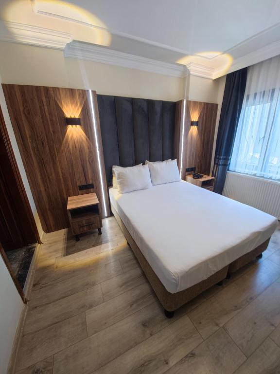Postel nebo postele na pokoji v ubytování Star Hotel