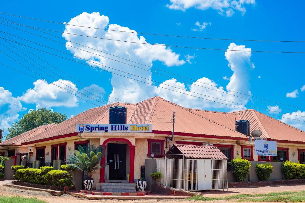 a building with a sign that reads spring hill hotel at Spring Hills Hotel - Morogoro in Morogoro