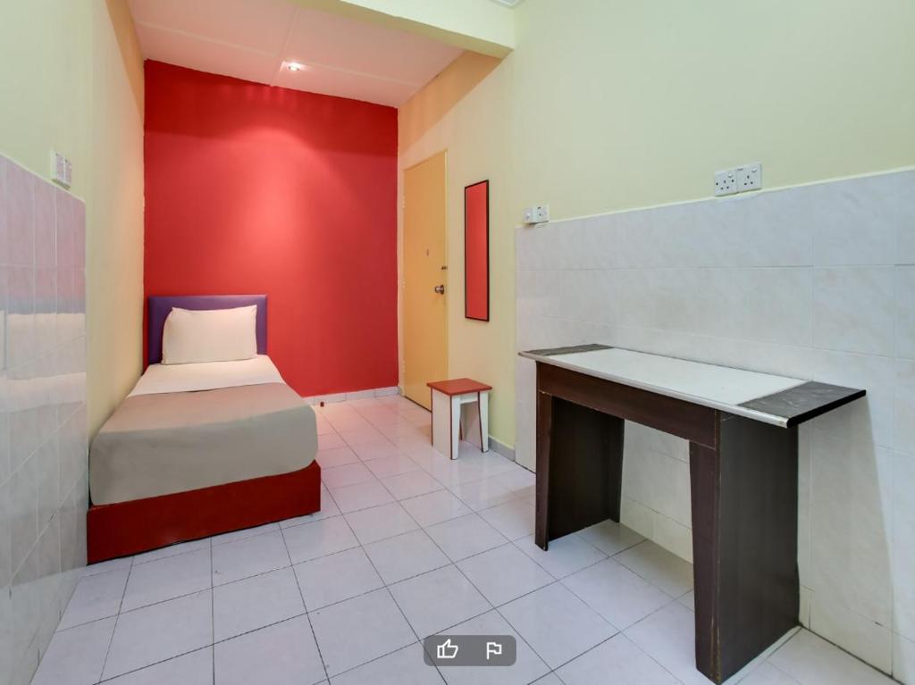 Postel nebo postele na pokoji v ubytování T FAMILY HOTEL