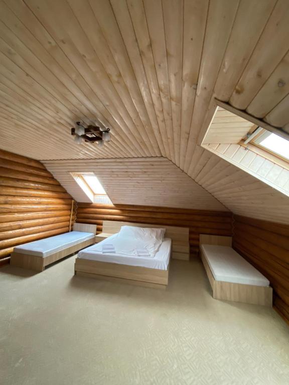 En eller flere senge i et værelse på Візит