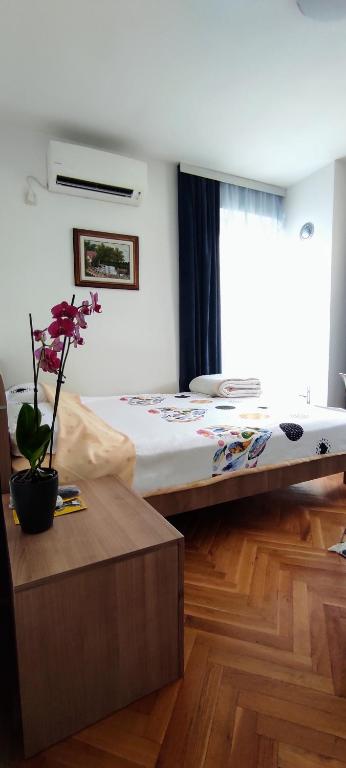 Postel nebo postele na pokoji v ubytování Vila Sentić