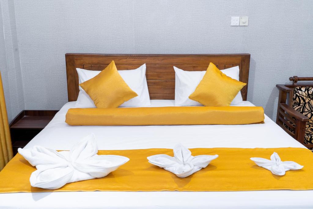 Postel nebo postele na pokoji v ubytování Anoo Garden Villa