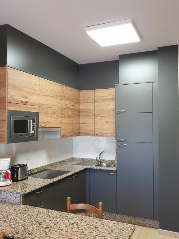 Kuchyň nebo kuchyňský kout v ubytování Apartamentos Atlántico Resort