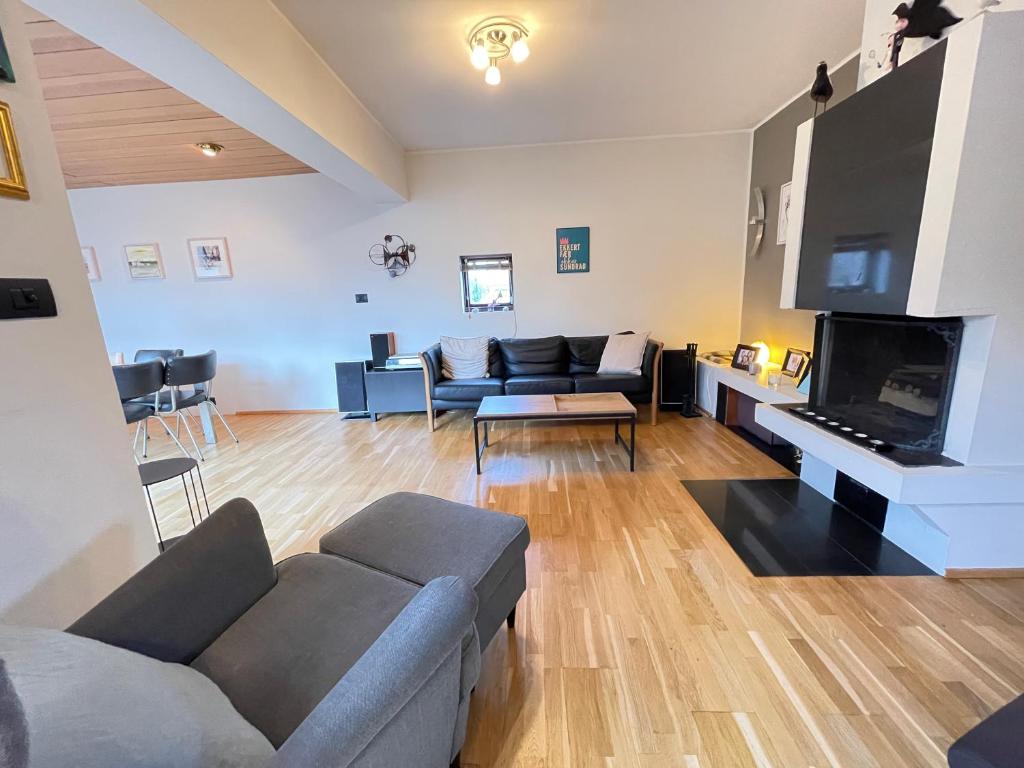 En sittgrupp på Cosy and family friendly house in Reykjavik centrally located in Laugardalur