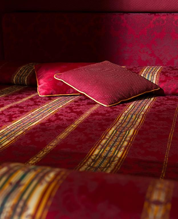 Postel nebo postele na pokoji v ubytování Chiaja Hotel de Charme