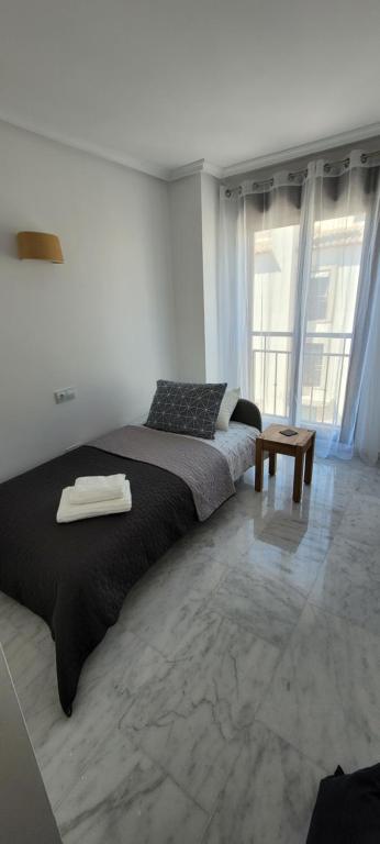 Postel nebo postele na pokoji v ubytování Luxury apartment in the heart of Moraira & 200mtrs from the sea