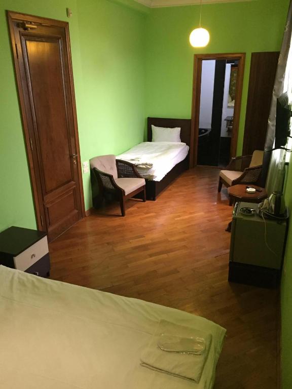 Postel nebo postele na pokoji v ubytování hotel amber