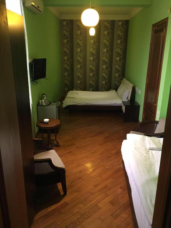 Postel nebo postele na pokoji v ubytování hotel amber