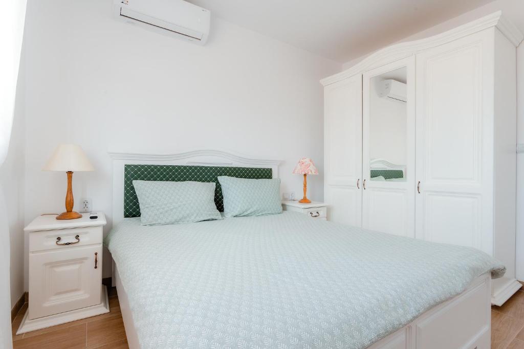 Postel nebo postele na pokoji v ubytování Casa Mavis