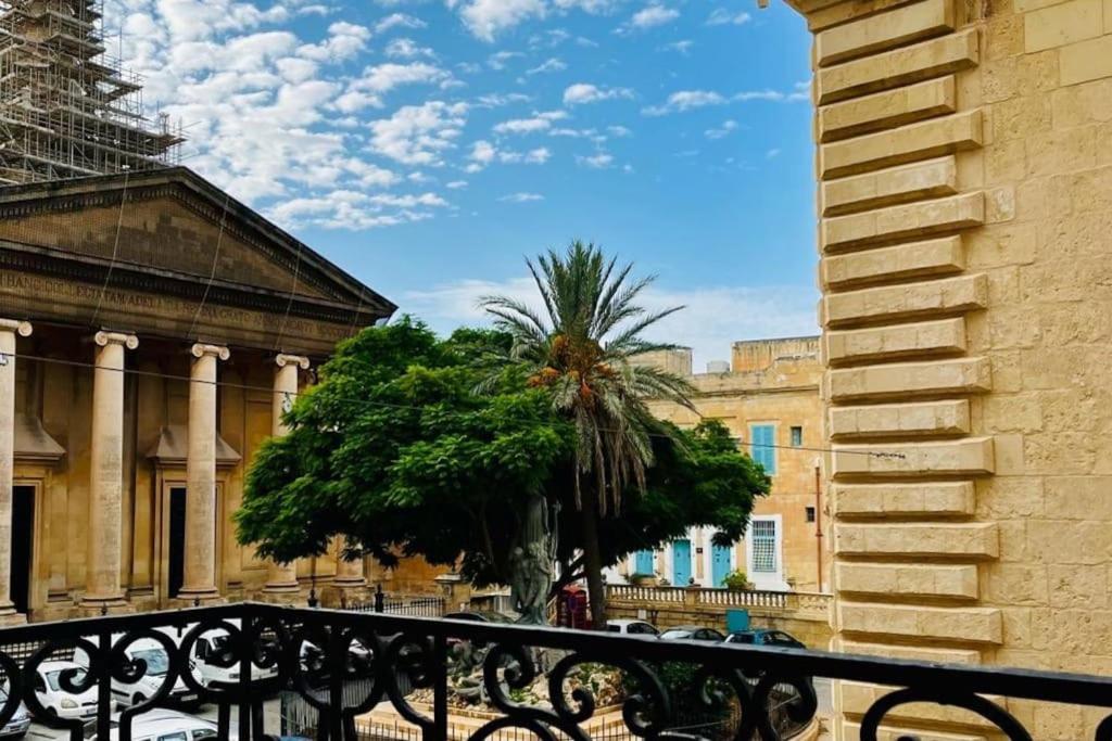 a view of a city from a balcony at House of Character in Valletta in Valletta