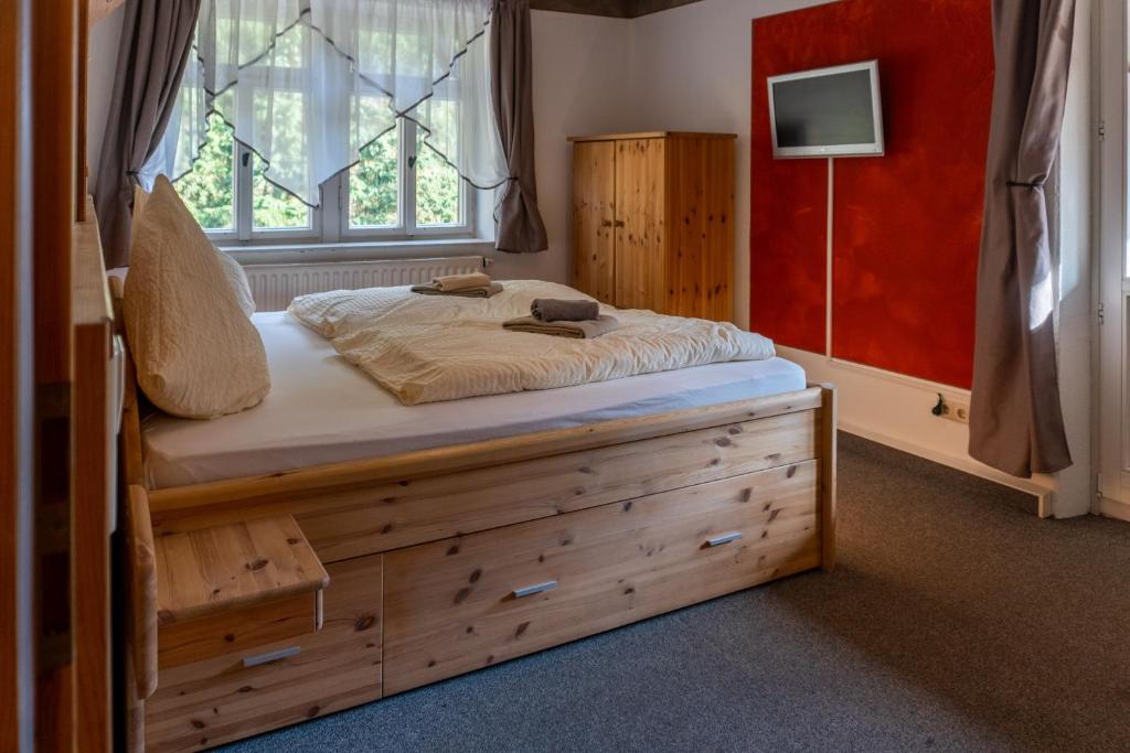 Postel nebo postele na pokoji v ubytování Pension Schrammsteinbaude