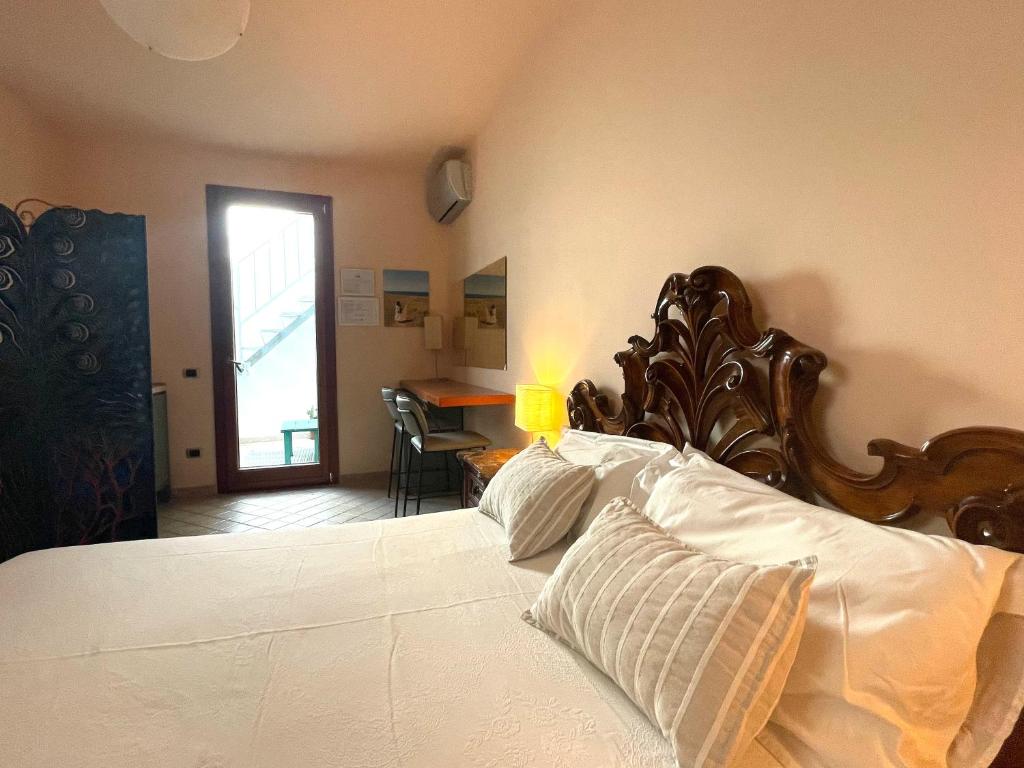 Postel nebo postele na pokoji v ubytování B&b Ophelia