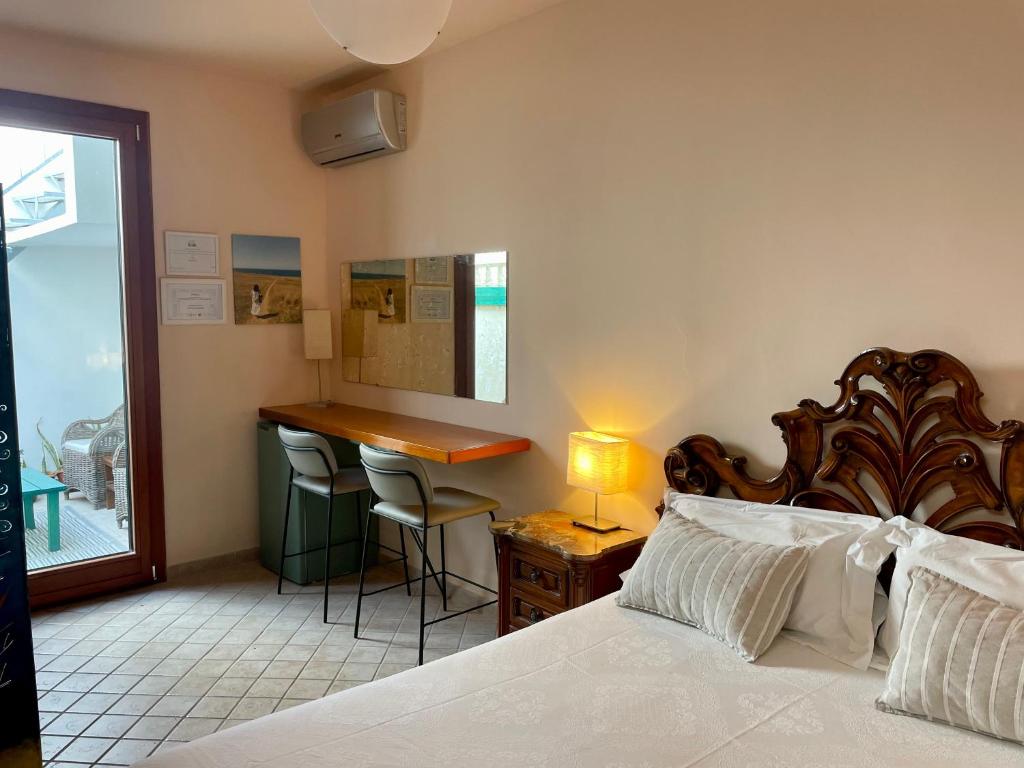 Postel nebo postele na pokoji v ubytování B&b Ophelia