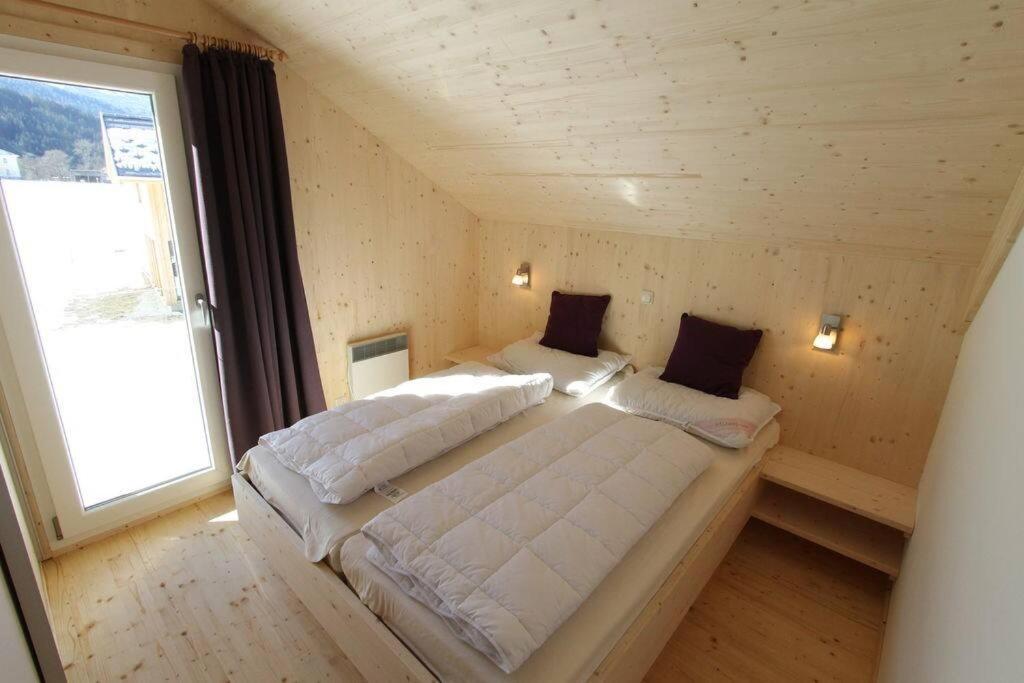 Chalet Murau: Luxurious 5 star chalet in ski area Kreischberg tesisinde bir odada yatak veya yataklar