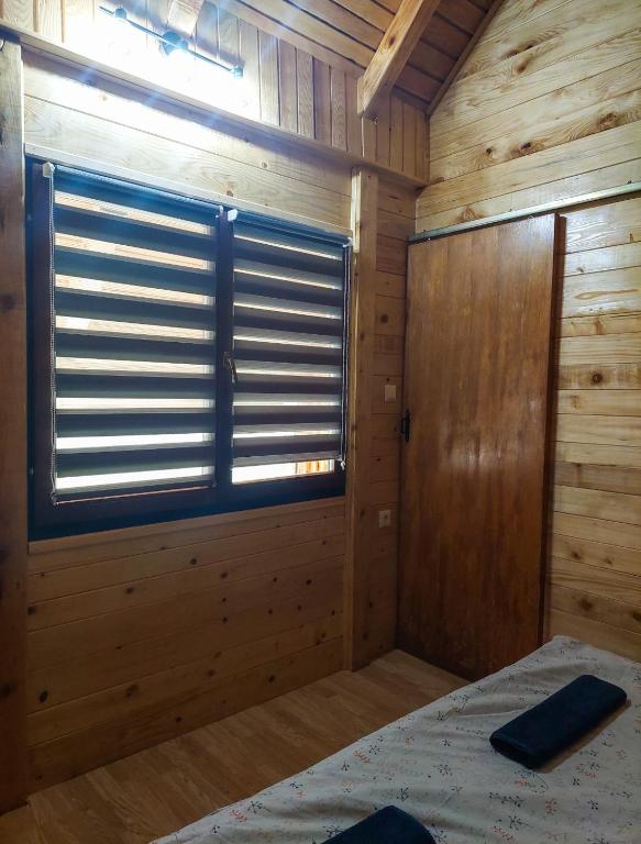 Postel nebo postele na pokoji v ubytování Hacienda Burzić