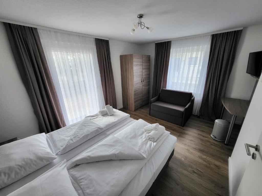 Postel nebo postele na pokoji v ubytování Hotel Dea