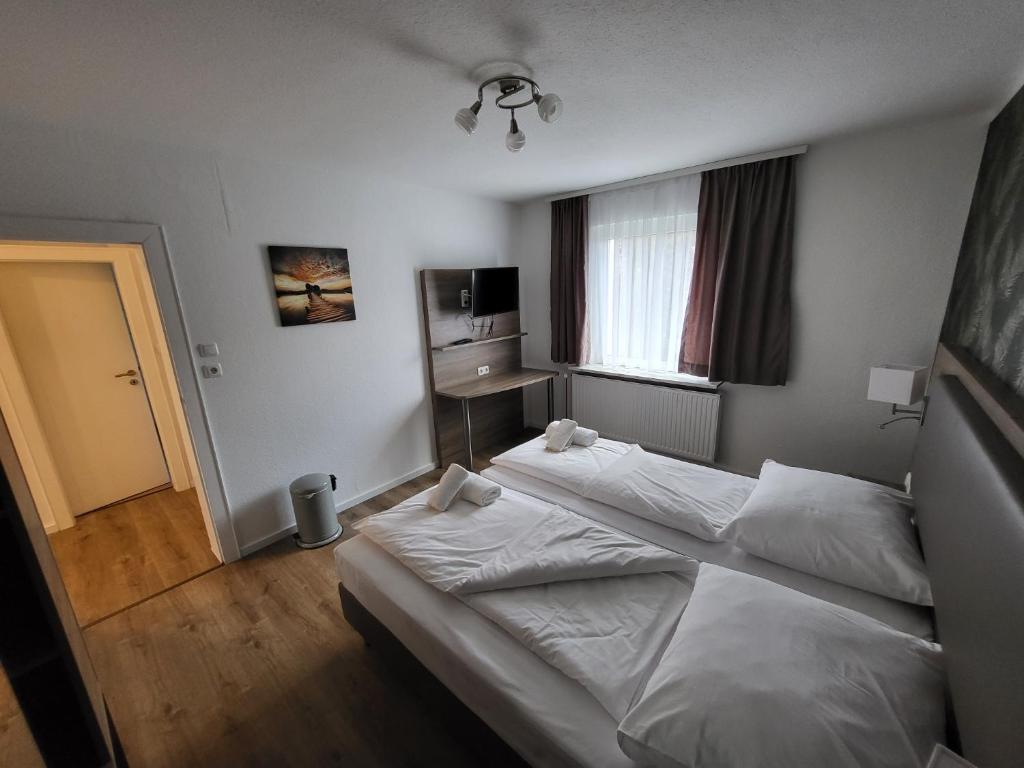 Postel nebo postele na pokoji v ubytování Hotel Dea