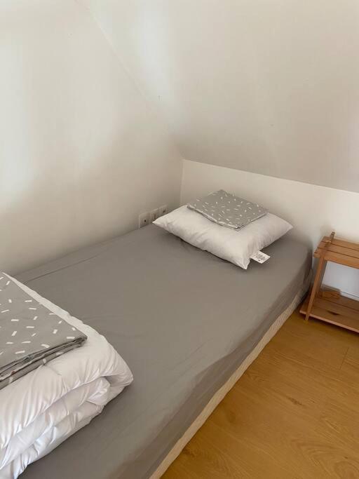 Una cama o camas en una habitaci&oacute;n de Studio 4 personnes entre Rouen et la mer