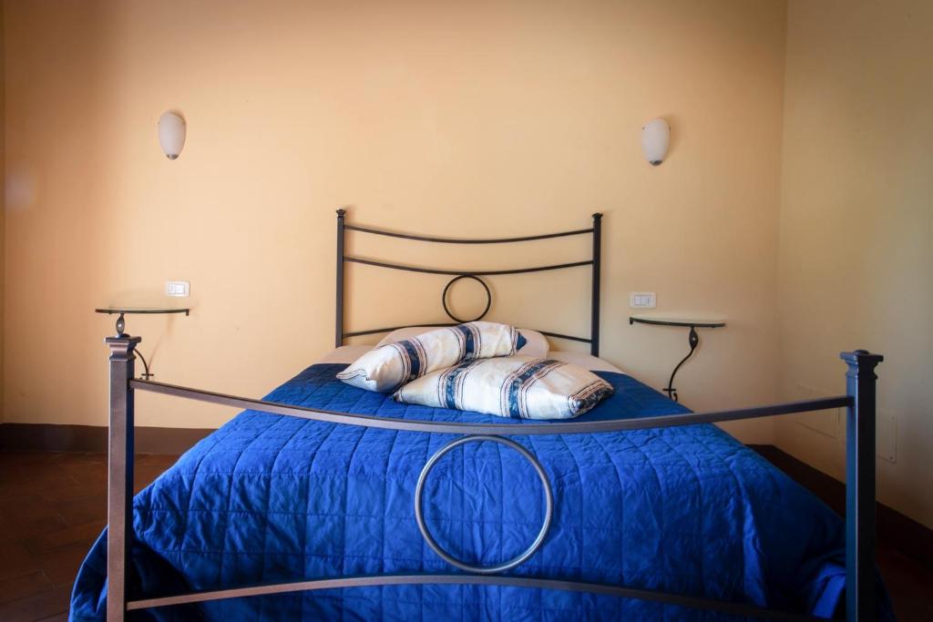 Postel nebo postele na pokoji v ubytování Albergo San Lorenzo