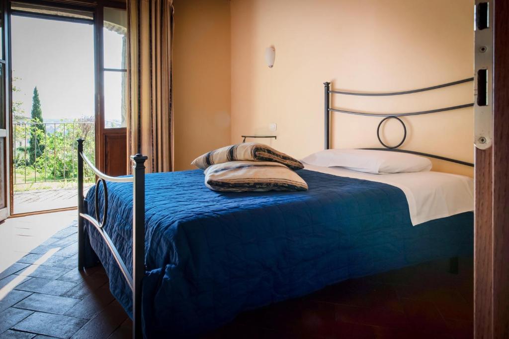 Postel nebo postele na pokoji v ubytování Albergo San Lorenzo