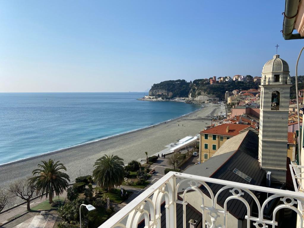 a view of the beach from a balcony at Attico Fronte Mare nel Borgo di Celle Ligure in Celle Ligure