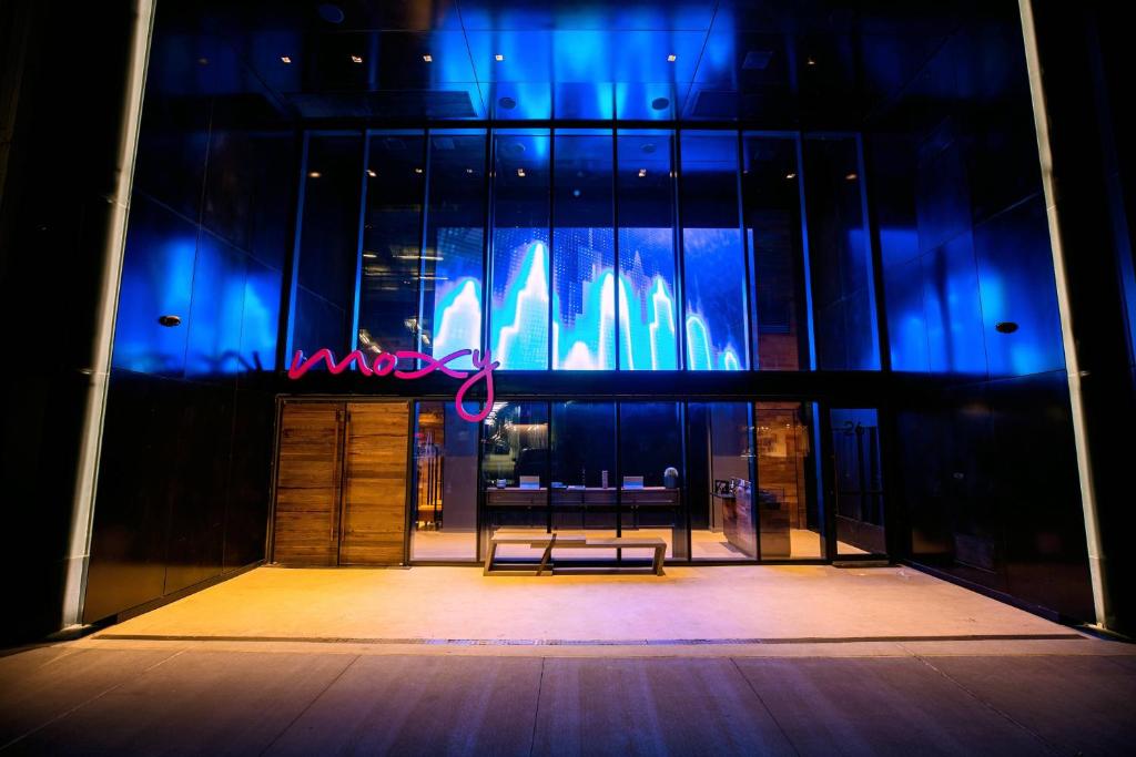 a stage with a bench in front of a building at Moxy NYC Downtown in New York