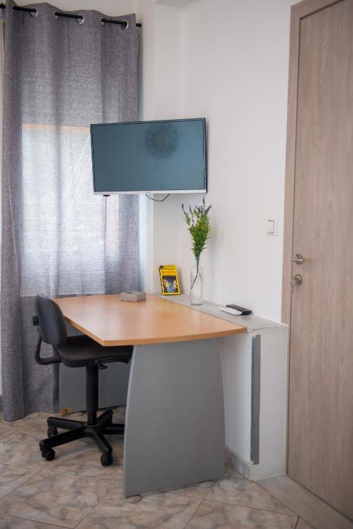 TV a/nebo společenská místnost v ubytování Merry Studios N3