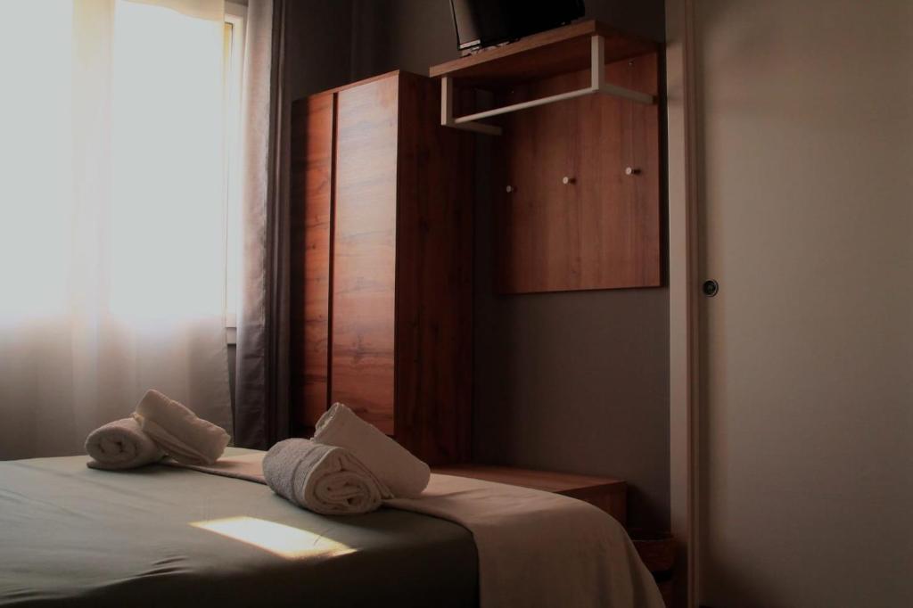 Postel nebo postele na pokoji v ubytování B&B Gasper