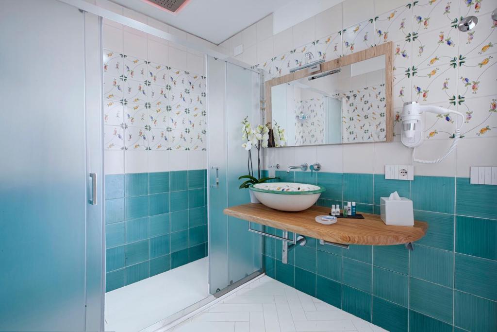 Koupelna v ubytování YourHome - Lidia Rooms & Suites