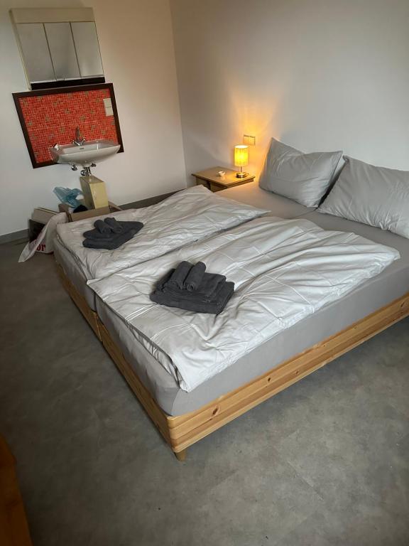 Postel nebo postele na pokoji v ubytování Gîte des Hurlevents