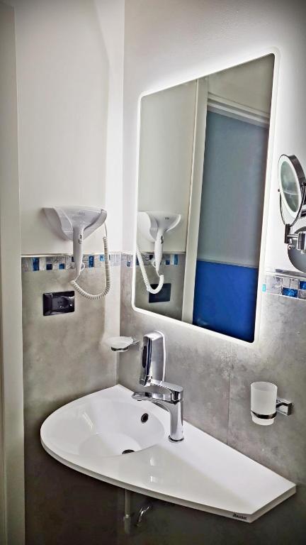 Koupelna v ubytování Hotel Blu Eden