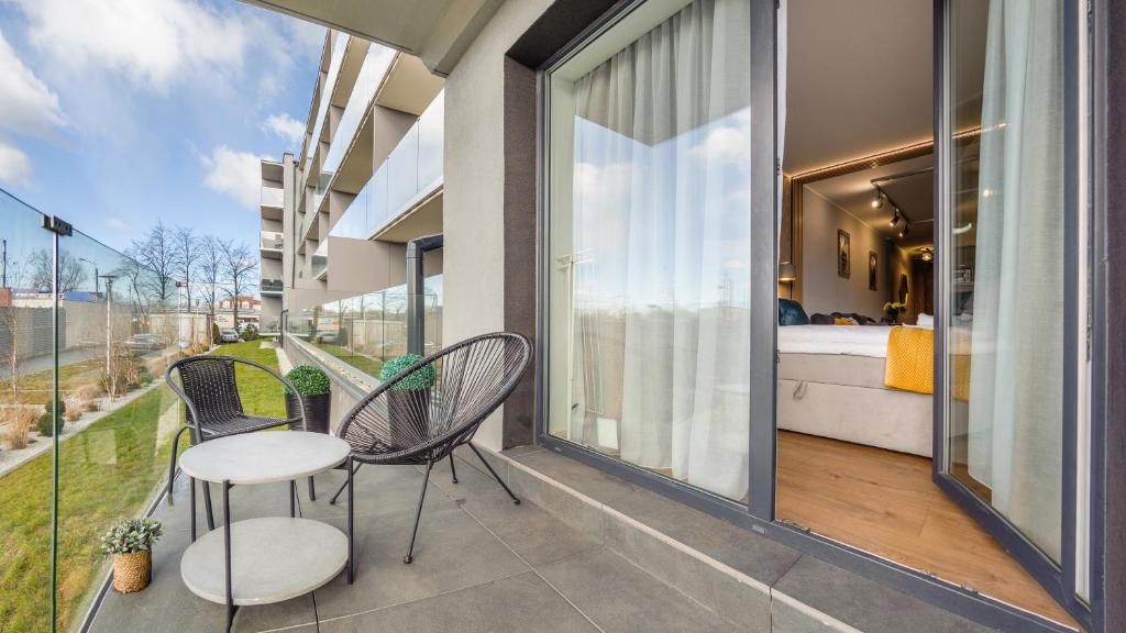 Balkón alebo terasa v ubytovaní Apartamenty Holiday City - Perłowa Przystań