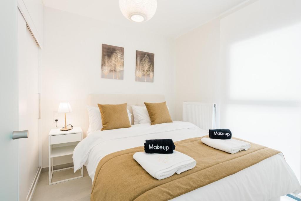 Postel nebo postele na pokoji v ubytování ESTEA Quality Living