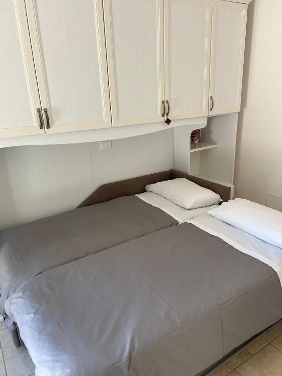 Posteľ alebo postele v izbe v ubytovaní I trulli di nonno Ernesto
