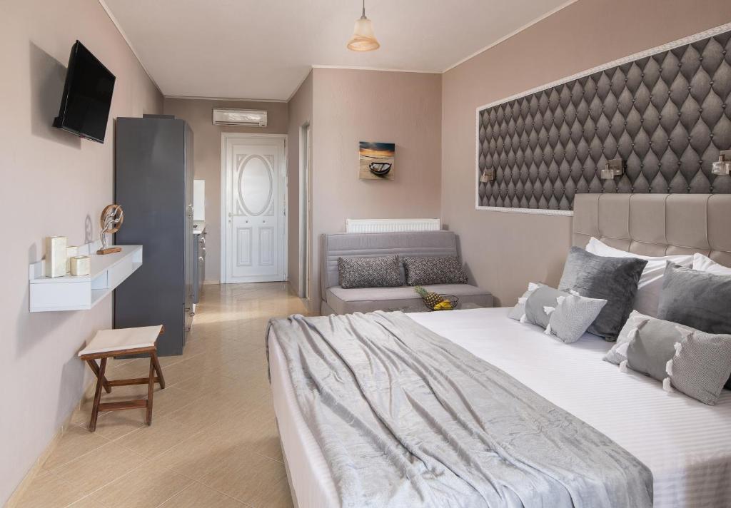 Łóżko lub łóżka w pokoju w obiekcie theodoroula house