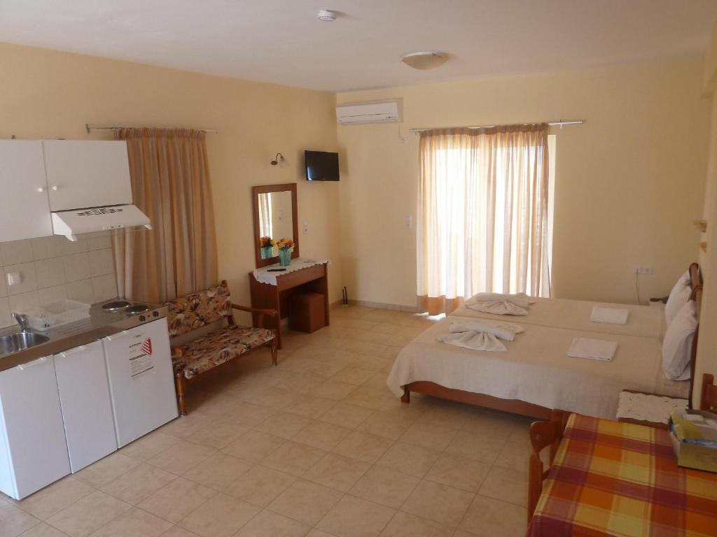 Postel nebo postele na pokoji v ubytování Elafonisos Diamond Resort