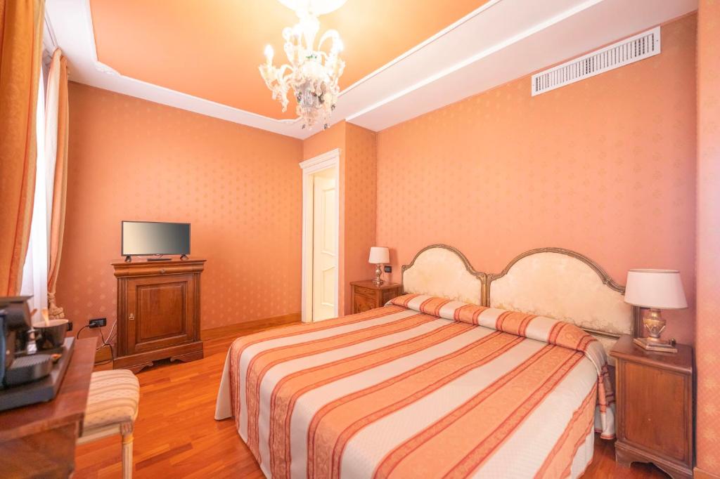 Postel nebo postele na pokoji v ubytování Cà Valeri