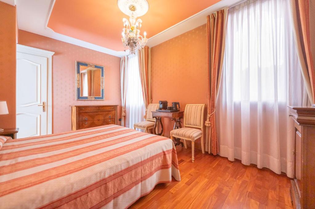 Postel nebo postele na pokoji v ubytování Cà Valeri