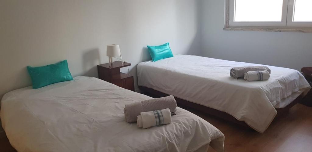 Ένα ή περισσότερα κρεβάτια σε δωμάτιο στο Sal Guest House