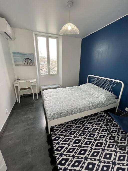 Posteľ alebo postele v izbe v ubytovaní Villa entièrement rénovée avec piscine en plein coeur de Bastia - Corse