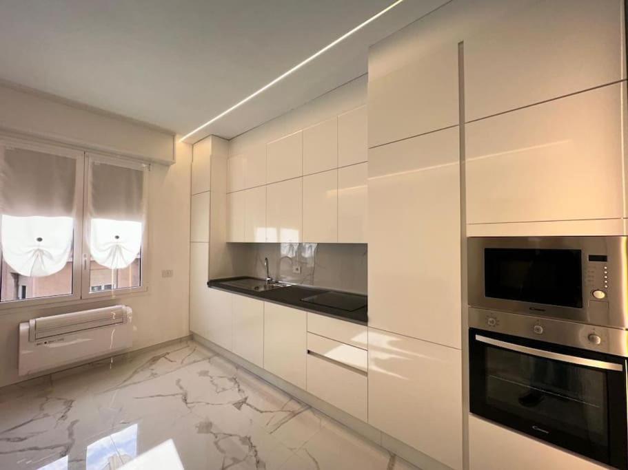 A kitchen or kitchenette at [Suite Aurora] Luxury in the center of Sanremo