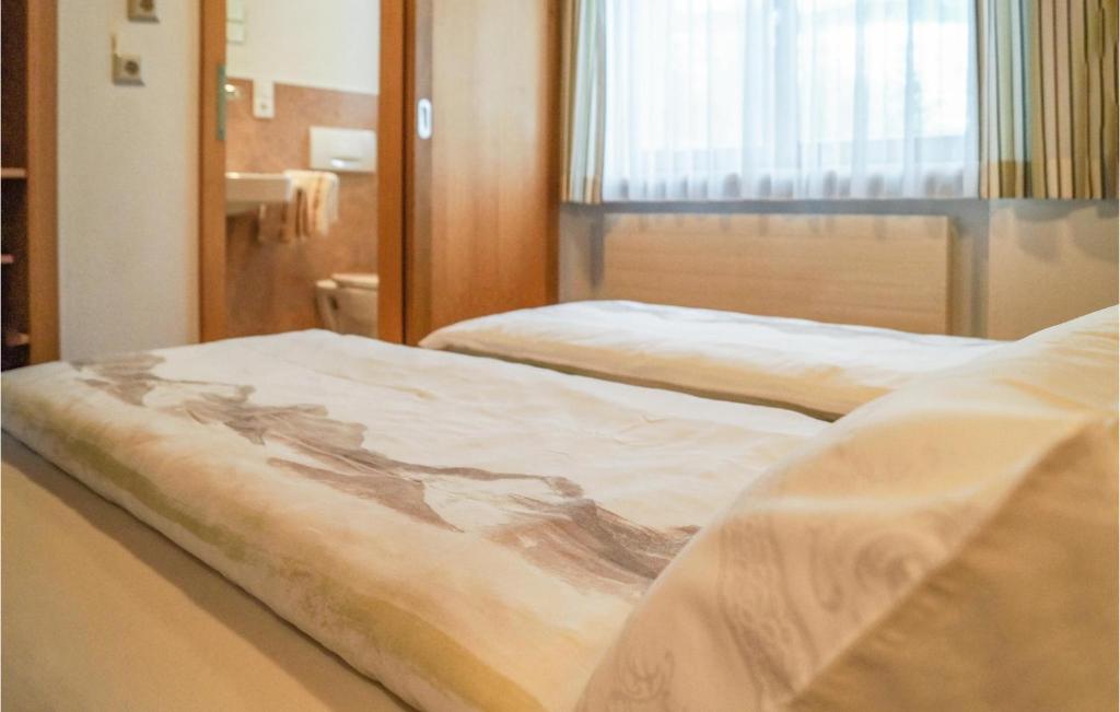Posteľ alebo postele v izbe v ubytovaní Schoene Ferienwohnung-Niederau