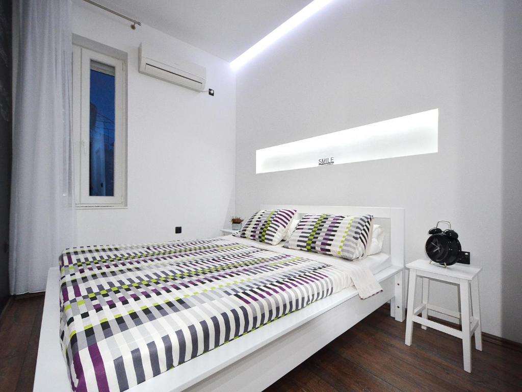 Cama o camas de una habitación en Apartment Split Smile