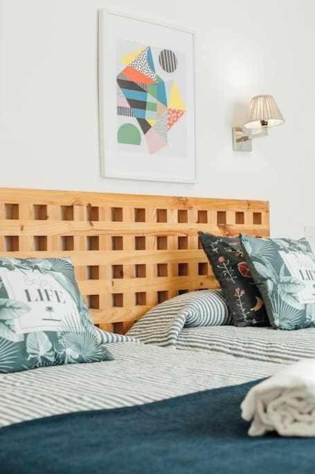 Posteľ alebo postele v izbe v ubytovaní Apartamento Boutique Abades